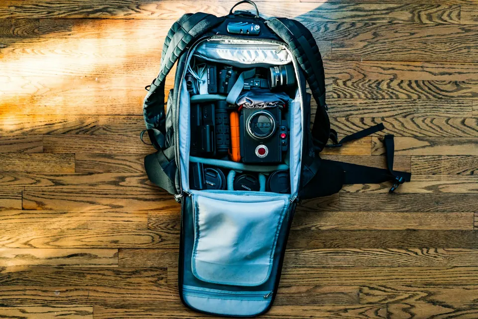 DSLR camera in a camera backpack