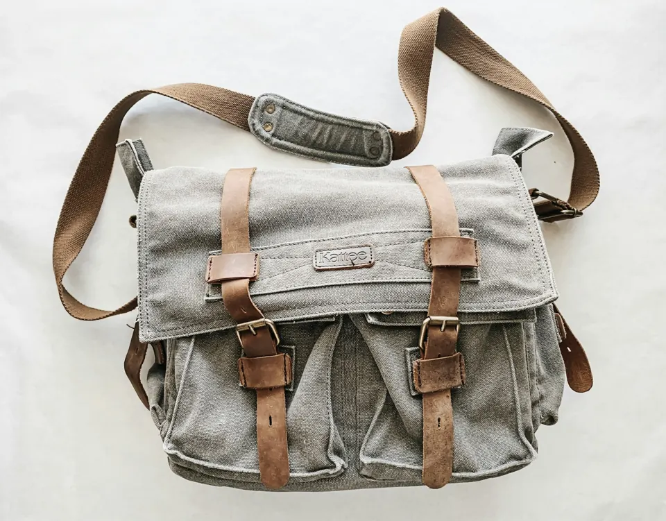 Gray and brown messenger bag