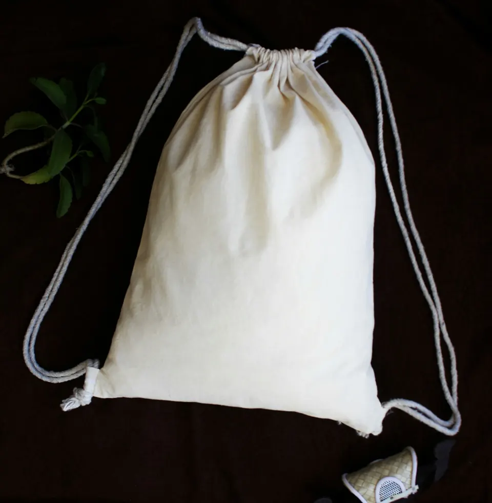 White and black sling bag