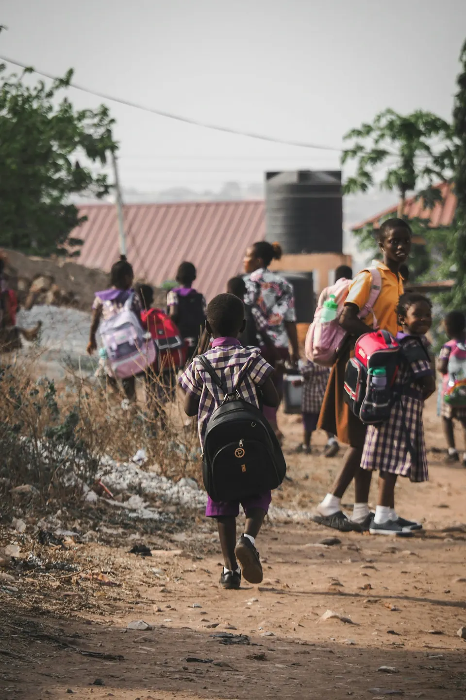 Children walk home after school