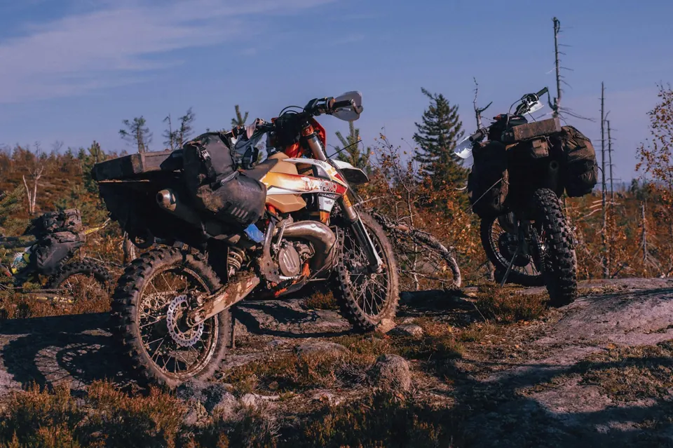Motorcycles with luggage on a ridge